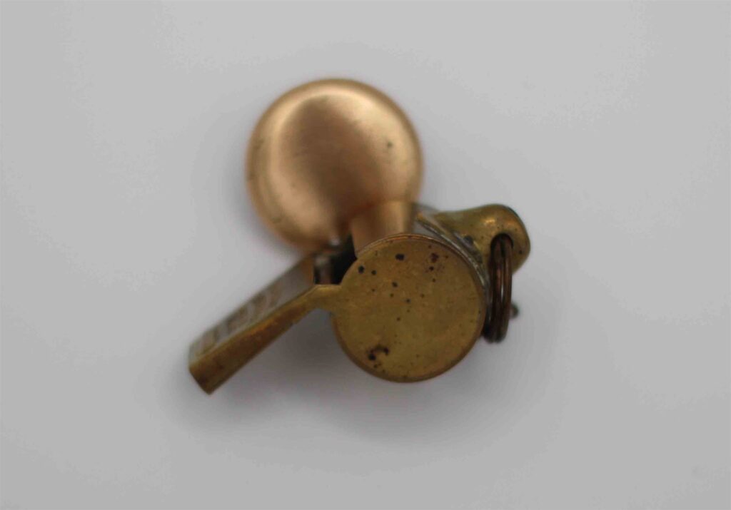 Brass police whistle