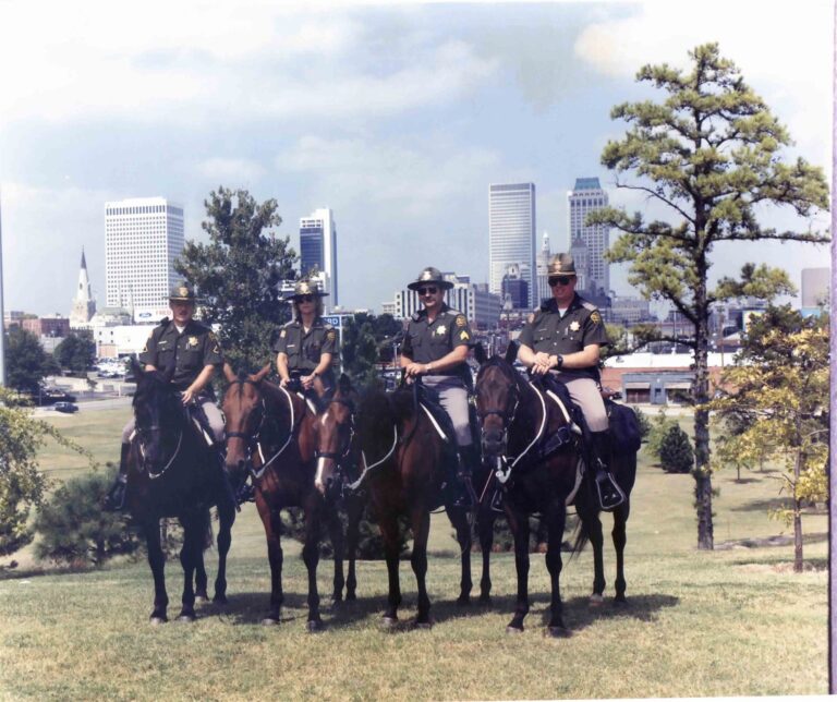 Mounted Patrol before the Tulsa skyline, 1990s
