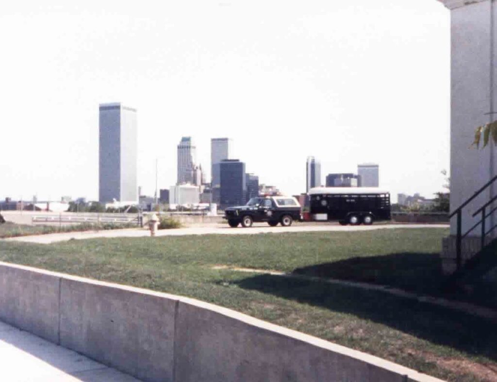Downtown Tulsa skyline with the mounted unit truck and trailer in the distance